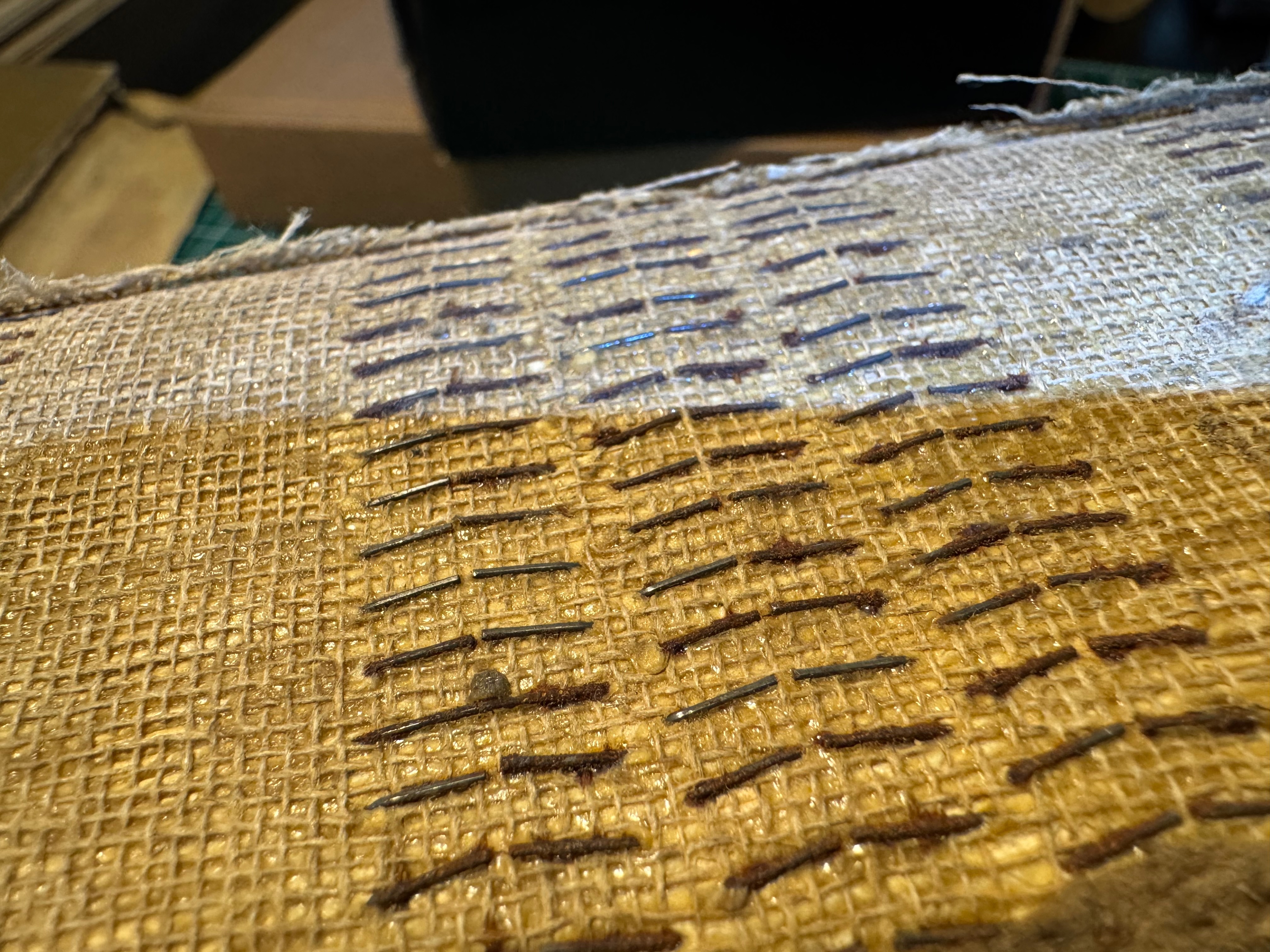 Staples folded outward against the spine